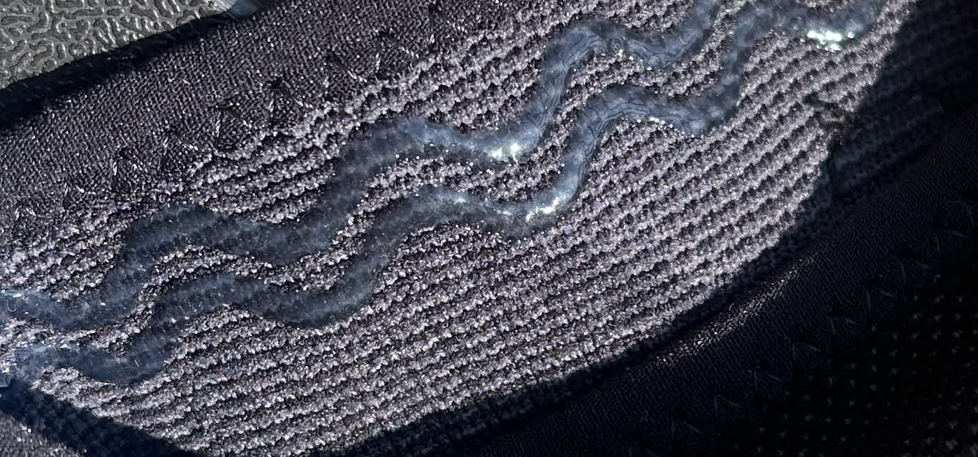 Close-up of the two silicone grip lines inside the upper hem of the Steadella sample